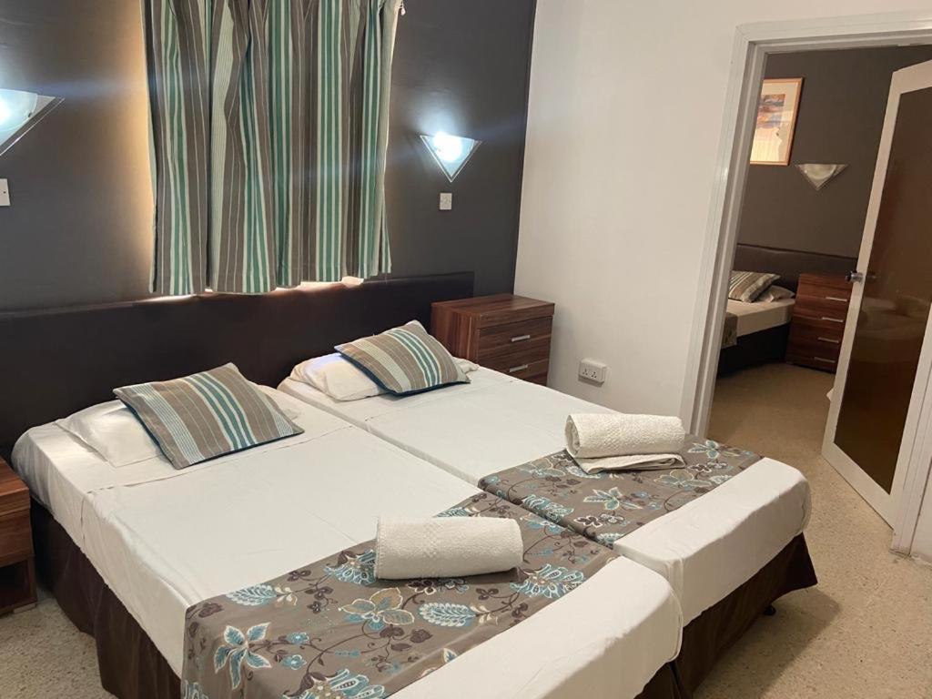 Sunstone Boutique Guest House Buġibba Extérieur photo